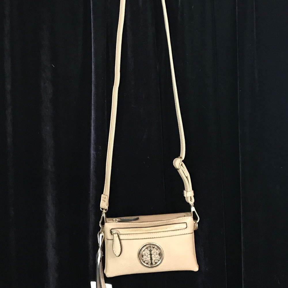 Small tan shoulder bag
